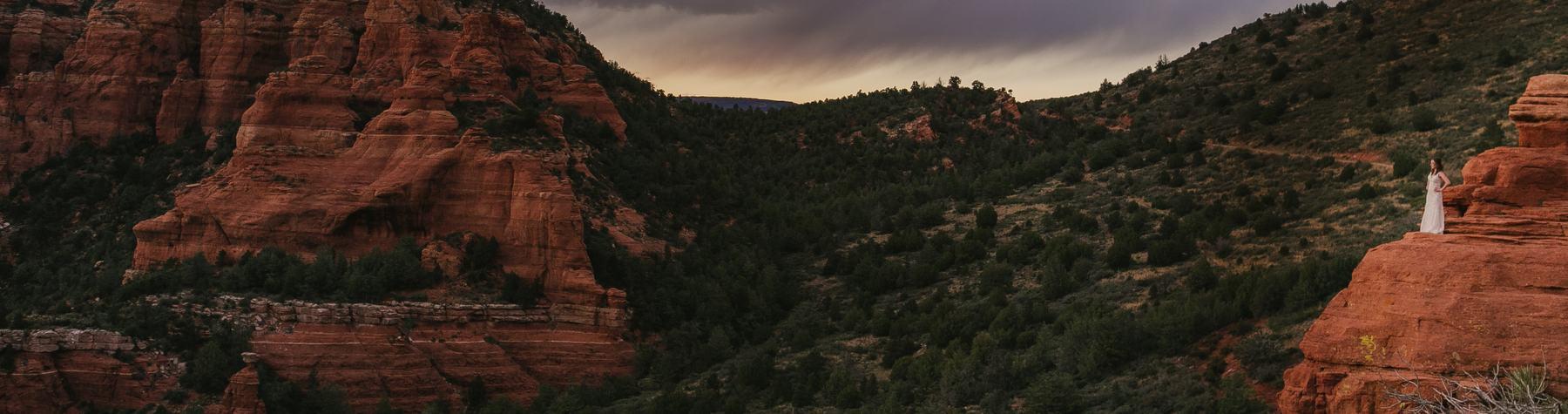 Press header image: Bride looks out over the red rocks of Sedona, AZ.